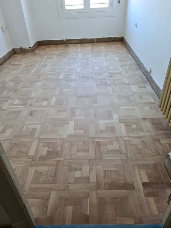 Reparación y restauración de parquet de taco de roble Andreu Parquets