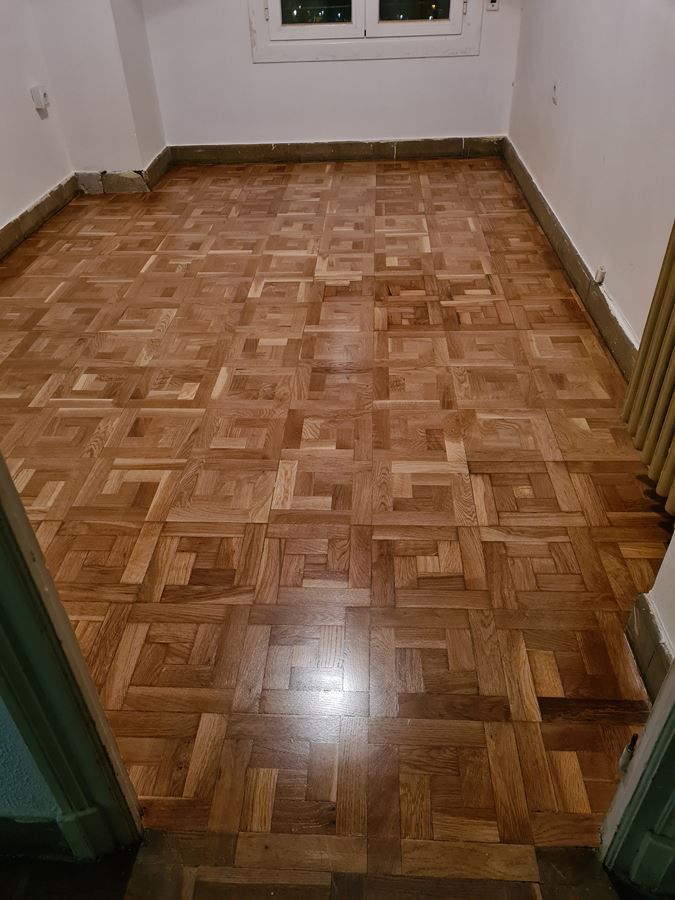 Reparación y restauración de parquet de taco de roble Andreu Parquets