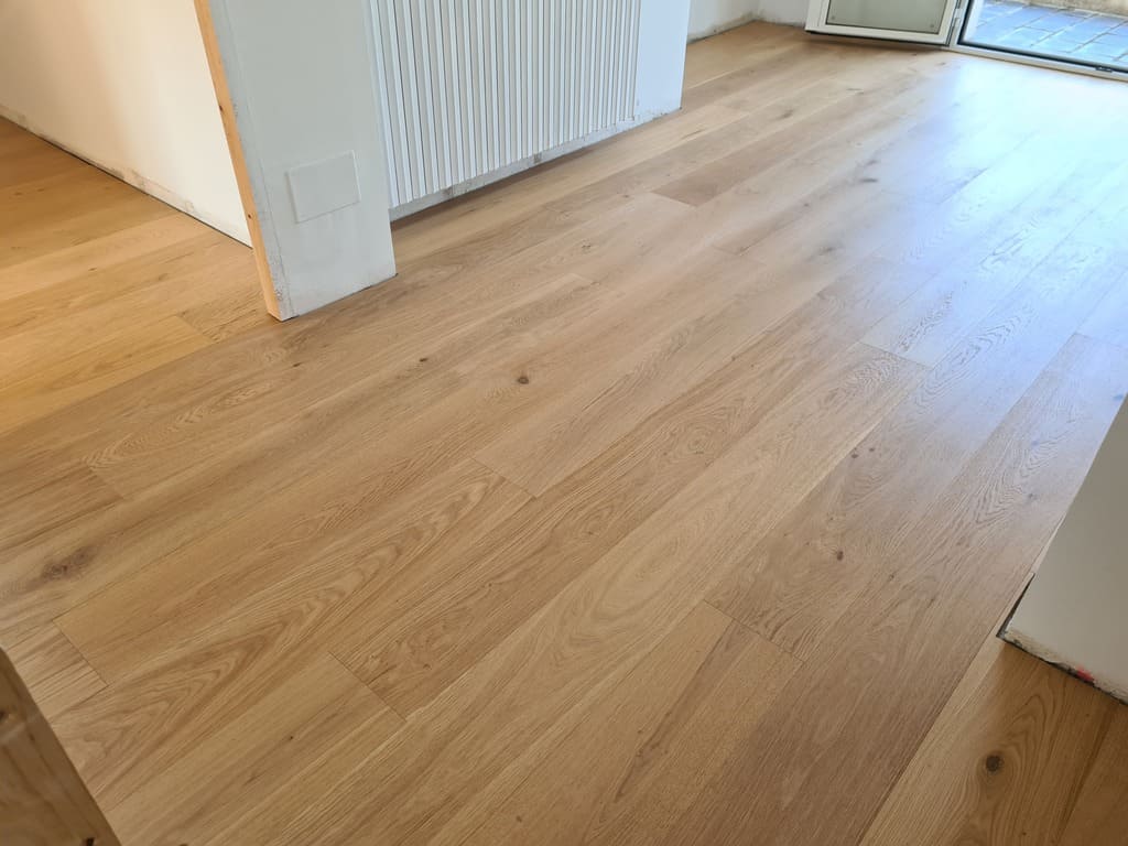 Detalle del suelo de parquet colocado Andreu Parquets