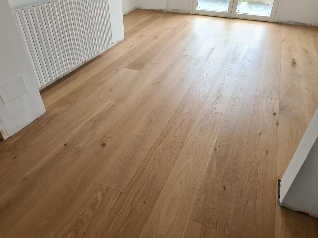 Detalle del suelo de parquet colocado Andreu Parquets