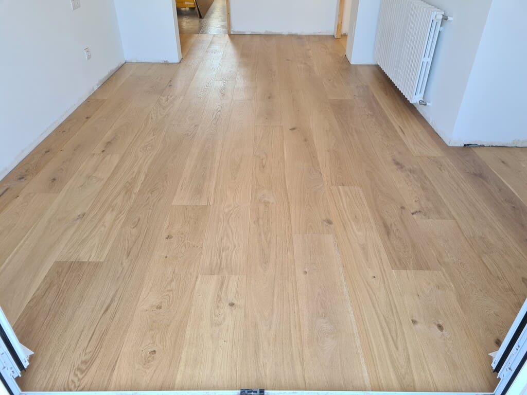 Detalle del suelo de parquet colocado Andreu Parquets